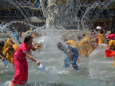 In the “Daizu Water Celebration” the Dai ethnic minority show their devotion and love for water.  There’s a lot of water being splashed at each other.  I had to adjust my camera to take a few pictures a second, so that I could capture the water in its ful